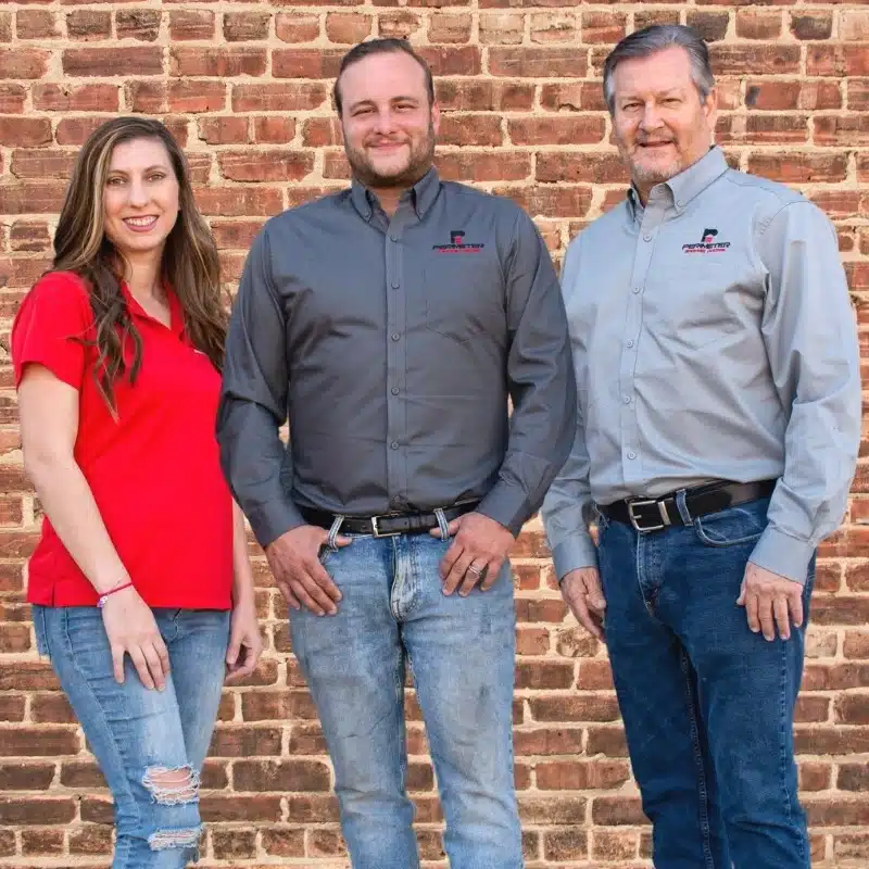 Perimeter Garage Doors team members in branded shirts in Villa Rica, GA